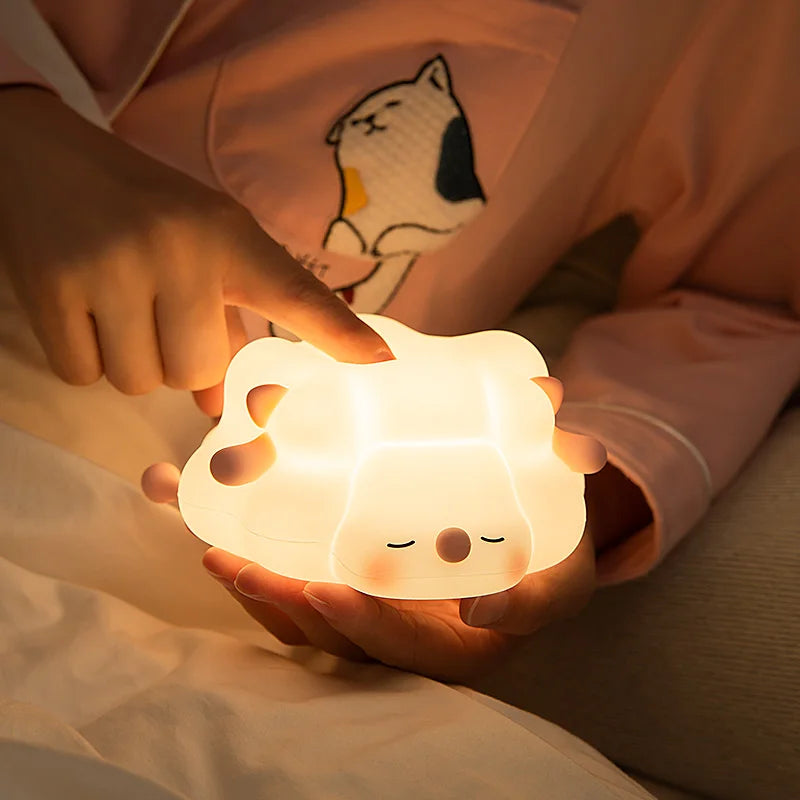 A soft, glowing sheep night light that also functions as a mobile phone holder. Its cozy light creates a relaxing atmosphere while securely holding your phone, making it perfect for both bedtime and hands-free use.